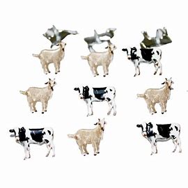 Cows   Brads 12  pieces